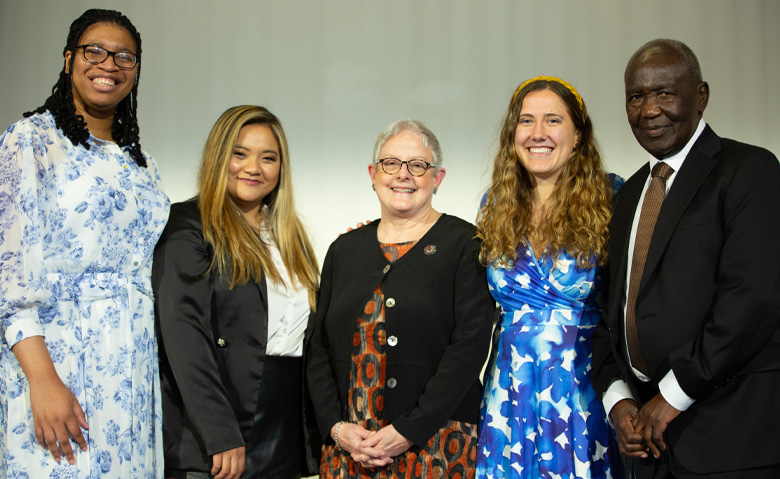 Photo of Creative Writing Awards honorees, YSN Interim Dean Holly Powell Kennedy, and speaker Michael Shirima