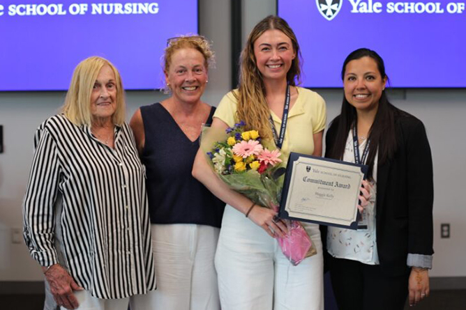 Maggie Kelly receiving the 2025 Commitment Award