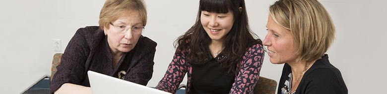 Women looking at paperwork