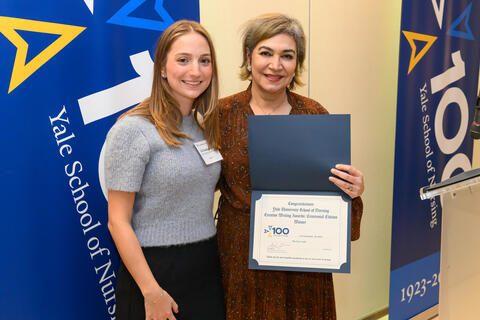 Liz Daskalakis ’26 MSN with Dean Emami at YSN's 21st annual Creative Writing Awards