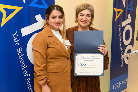 Yosra Raziani ’29 PhD with Dean Emami at YSN's 21st annual Creative Writing Awards