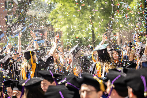 YSN students celebrate Commencement 2022 in a shower of confetti.