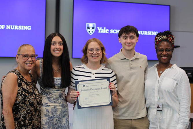 Kristin Zanjani receiving the 2025 Inclusive Excellence Award